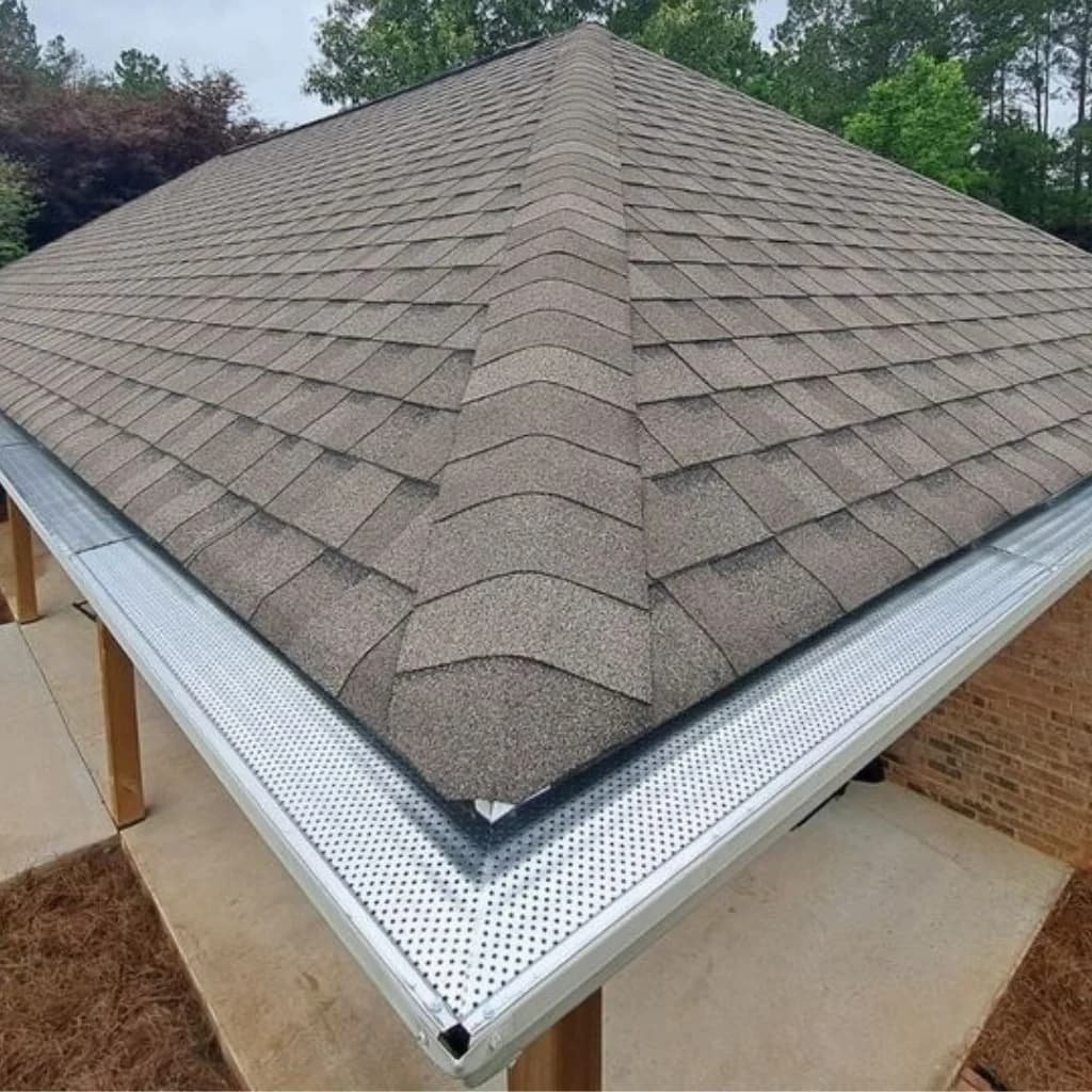 Roofline with newly installed Shur Flo gutter covers providing debris protection and improved water flow for a home in Middle Georgia.